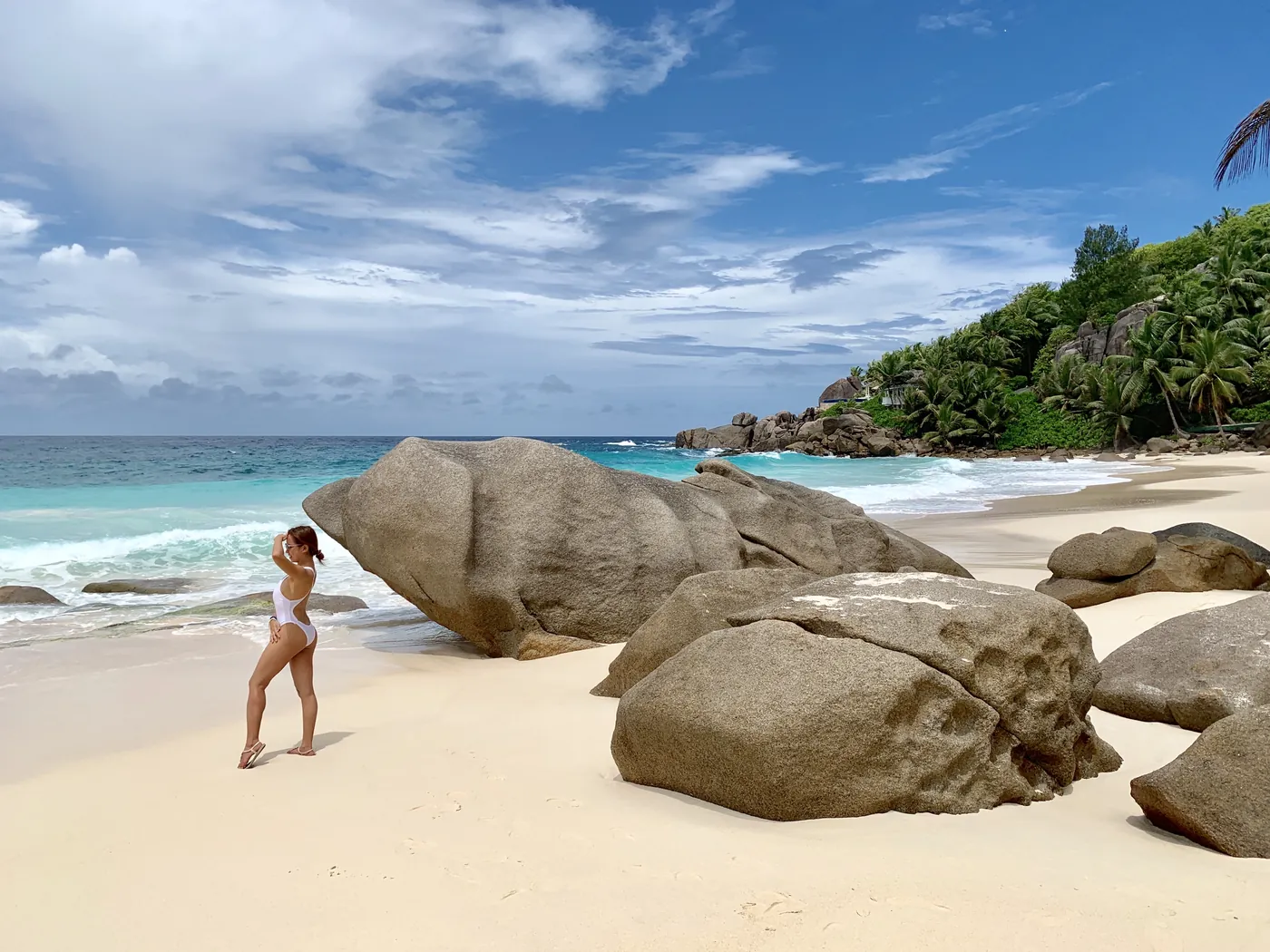 Granite boulders on a white-sand beach in Seychelles