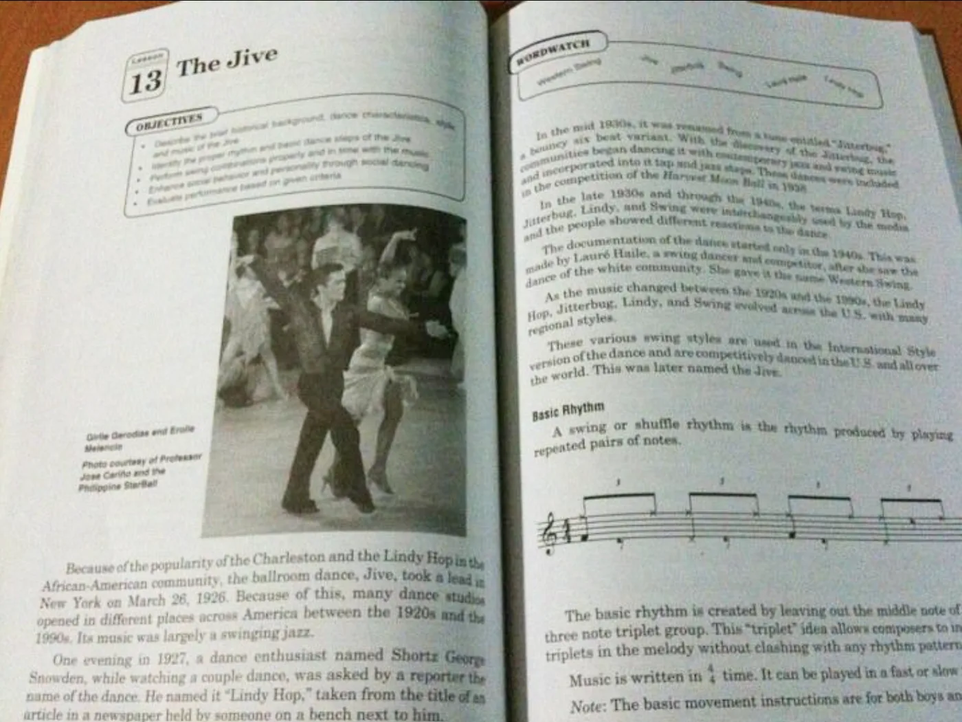 An open Philippine PE textbook with a photo of Dee and John Erolle dancing the jive